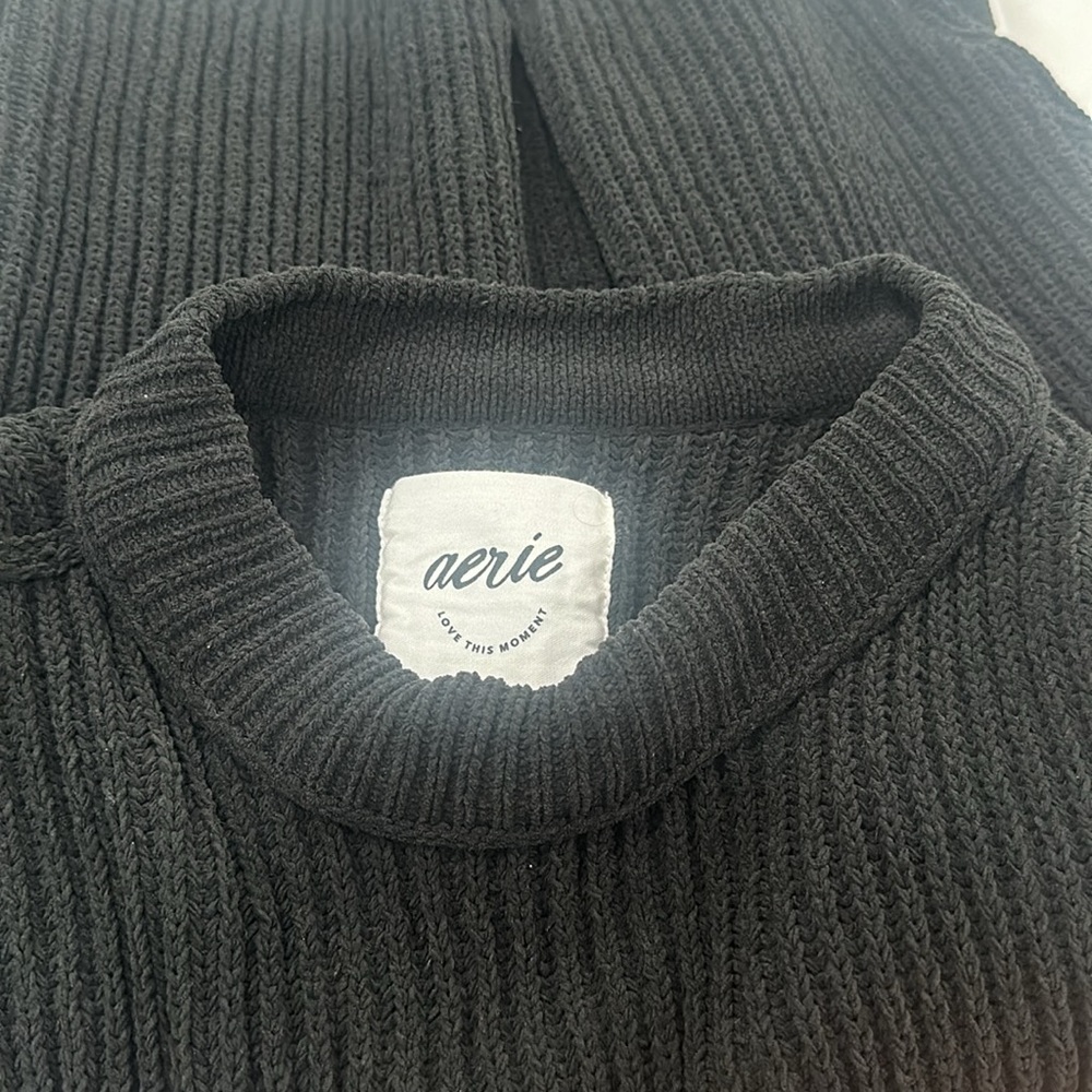 Black aerie sweater, with cutouts on the sides! Perfect for fall!